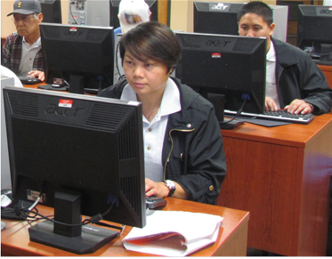 Veteran Upward Bound student working on computer